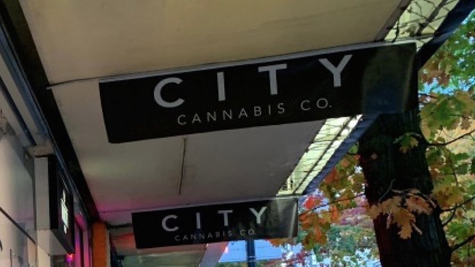 Signage on Robson Street hangs where City Cannabis Co. operated before it started to get fully legal