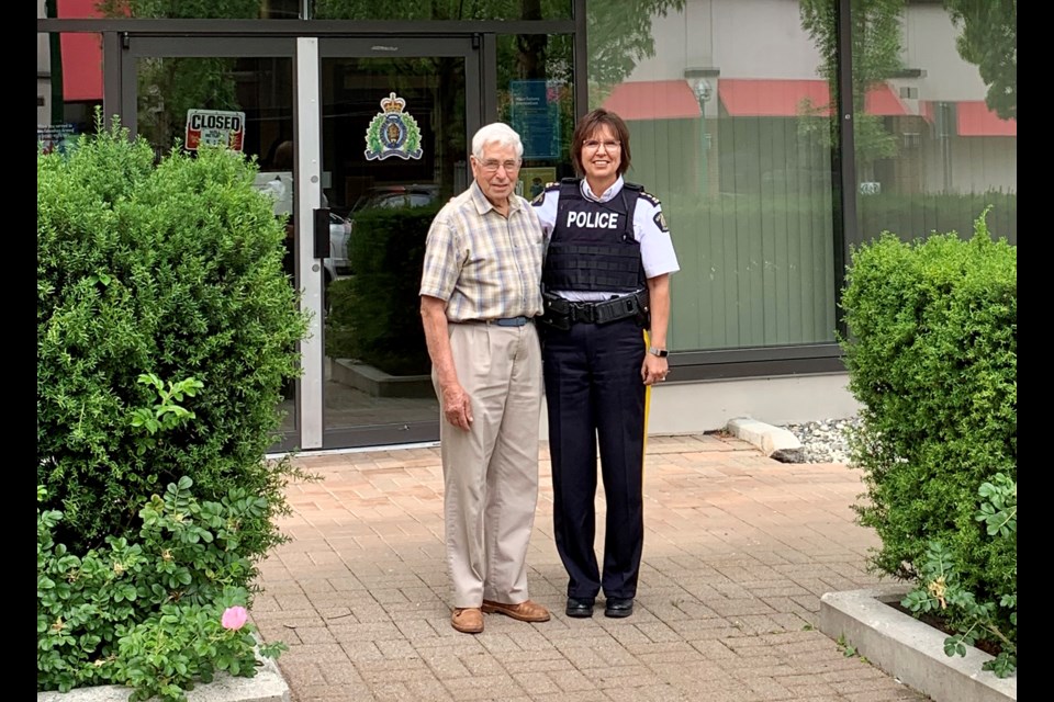 Longtime community policing volunteer Ray Allen poses with Burnaby RCMP Chief Supt. Deane Burleigh on his last day with the community policing advisory committee.