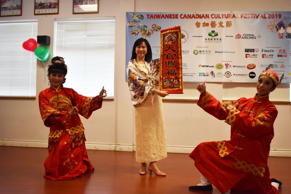 Esther Lin (middle),Taiwanese Canadian Cultural Festival committee chair, wishes Richmondites could come out to watch the show.