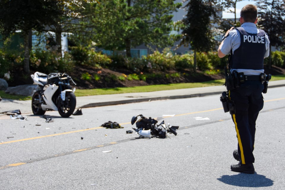 Investigators were on scene to determine the cause of a vehicle collision between a truck and a motorcycle on Coast Meridian Road in Port Coquitlam Friday afternoon.