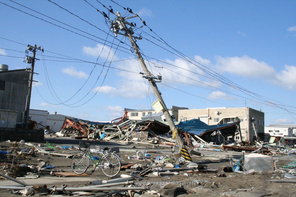 A fallen utility poll in the Japanese city of Ishinomaki, one of the areas hardest hit by the 2011 T