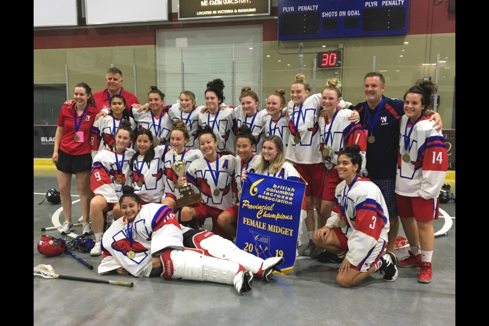 The New Westminster Salmonbellies celebrate their victory at the female provincials midget championships in Nanaimo last week.