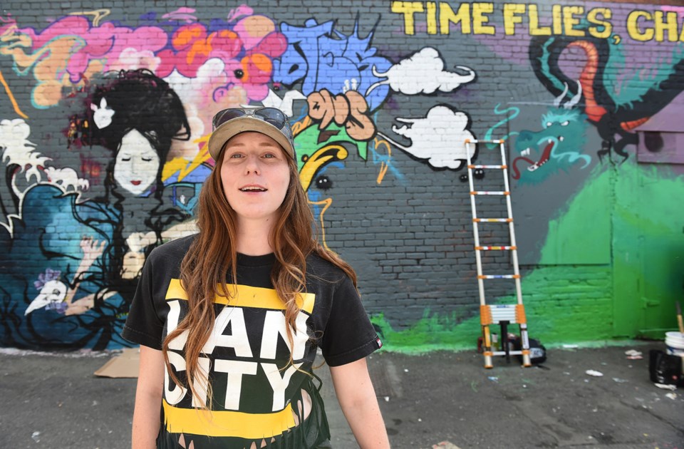 Jocelyn "Jose" McGillivray and her mural in the back alley of "zero block" between East Hastings and