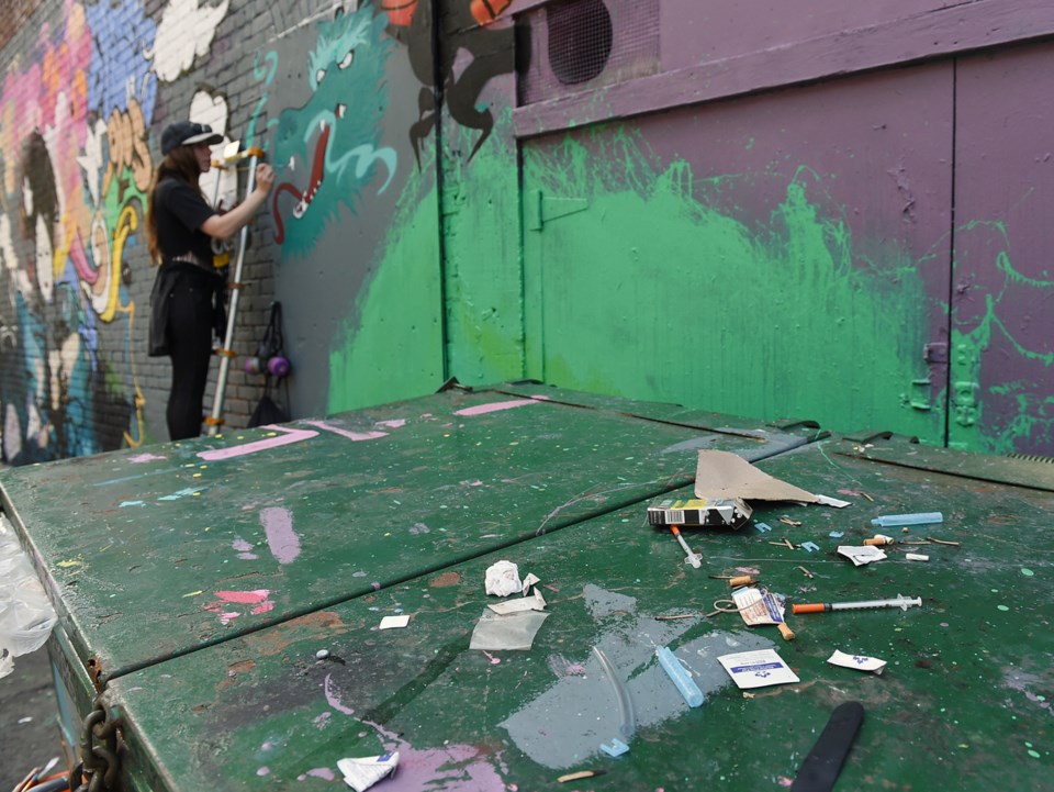 Drug use and overdoses are common themes in many of the murals in the alleyway behind the Overdose P
