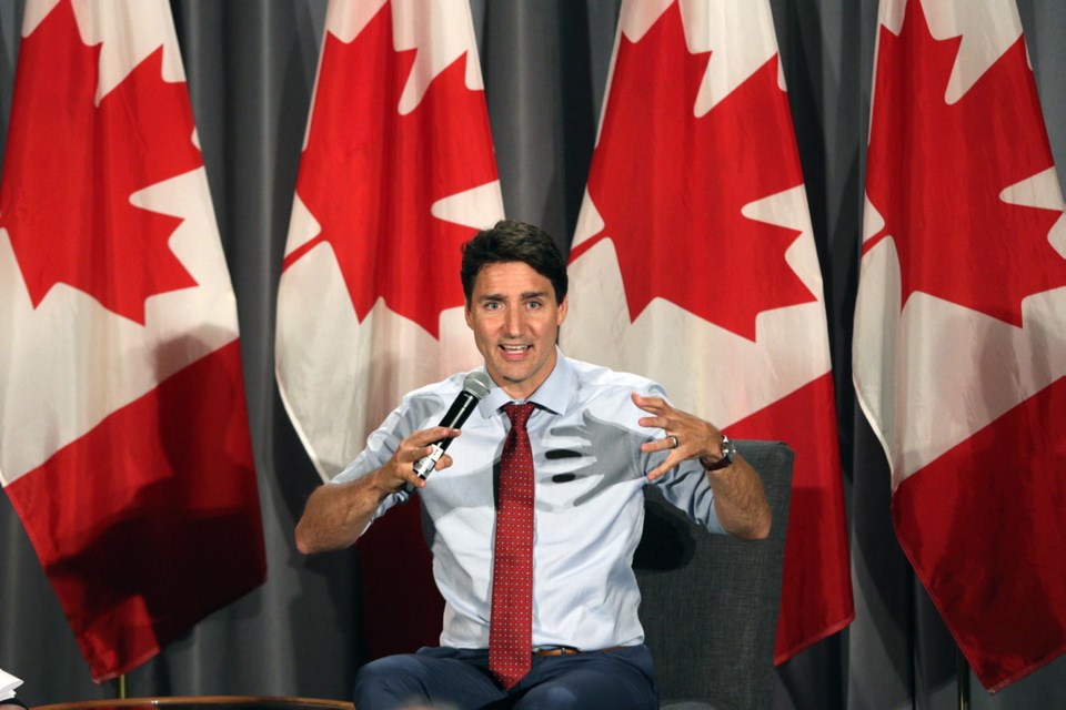 Prime Minister Justin Trudeau answers questions at a Liberal party fundraising event at the Victoria Ocean Pointe Resort hotel on Thursday night. July 18, 2019