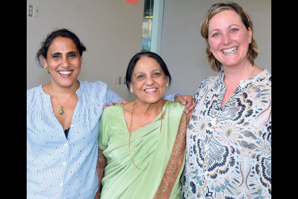 Sangeeta Dutt and mom Rani Dutt, Four Cups of Tea event co-organizer, and Katheryn Patterson.