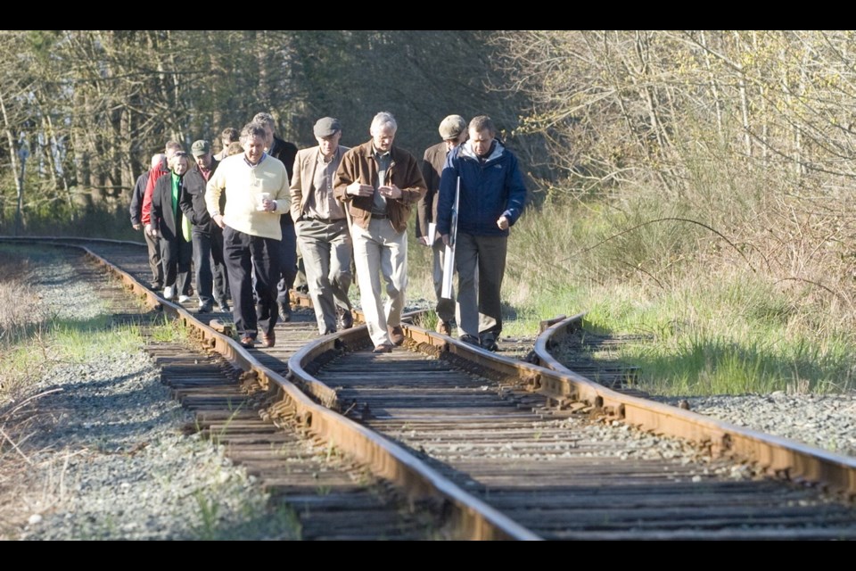 On April 15, 2009, the Capital Regional District&Otilde;s parks committee toured part of the proposed trail. The committee included Oak Bay Mayor Christopher Causton, the parks committee chairman, left, along with CRD chairman Geoff Young, View Royal Coun. John Rogers, and Jeff Ward, the CRD parks project manager.
