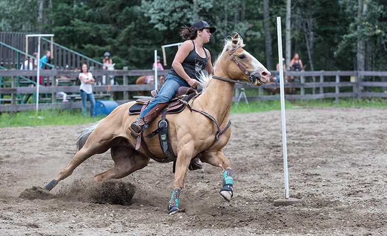 Alicia Vogl competes in the stakes event at the Salmon Valley Gymkhana Club on Friday evening. Citizen Photo by James Doyle
