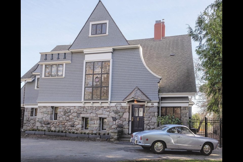 When the owners bought the house, the stone-faced ground floor was hidden by thick vegetation. A two-storey stained glass window brings light into the main staircase and the third floor.