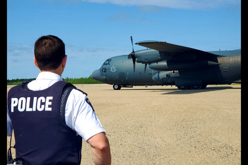 A military plane from Canadian Armed Forces arrives in Gillam to assist with the aerial search for Kam McLeod and Bryer Schmegelsky, July 27, 2019.