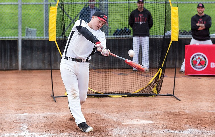 Cowichan Valley Mustangs player jace Hamm connects with a pitch for one of this ten home runs during the final round of the home run derby on Thursday evening at Nechako Park on the first day of the 2019 B.C. Minor Baseball double-A provincial championships. Citizen Photo by James Doyle