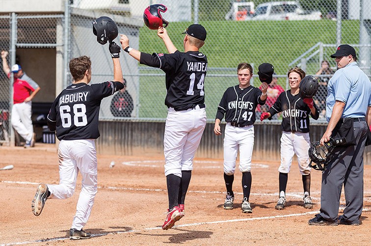 Prince George Jepson Petroleum Knights player Brenden Gaboury’s teammates greet him as he crosses home plate after hitting a home run over the left field wall against the Burnaby Braves on Saturday afternoon at Nechako Park during the 2019 B.C. Minor Baseball double-A provincial championships. Citizen Photo by James Doyle