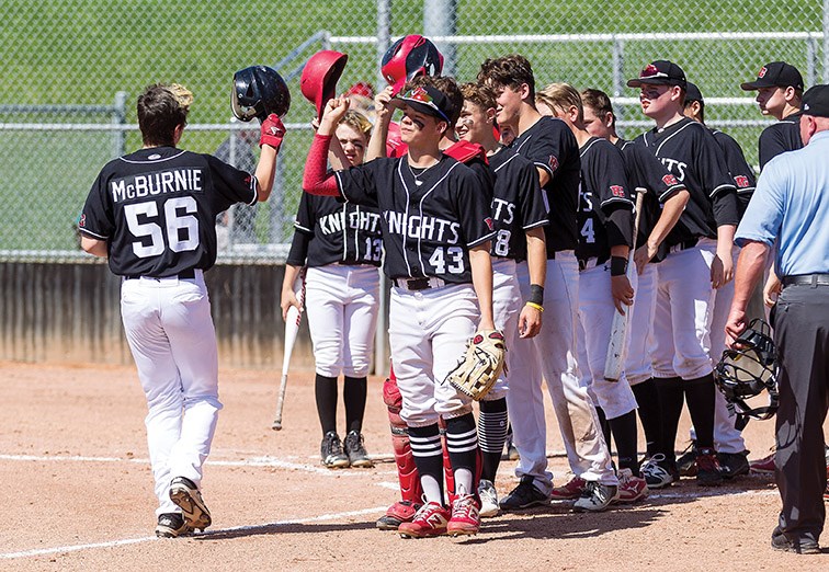 Prince George Jepson Petroleum Knights player Parker McBurnie’s teammates greet him as he crosses home plate after hitting a home run over the left field wall against the Ladner Red Sox on Sunday afternoon at Nechako Park during the 2019 B.C. Minor Baseball double-A provincial championships. Citizen Photo by James Doyle