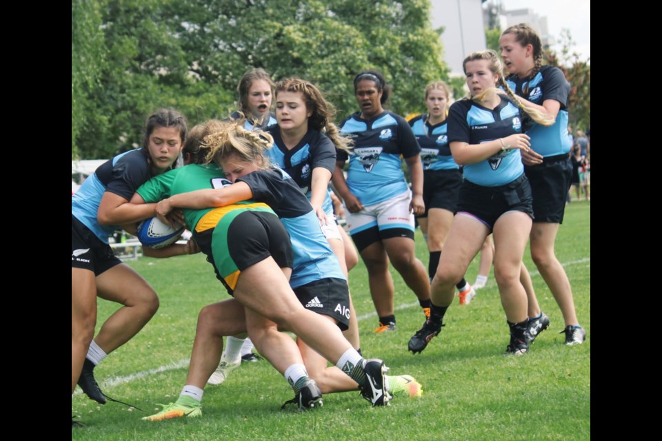 New Westminster's Willow Beyea, at centre making the tackle, has had a whirlwind summer, playing rugby in France at the World Games, for B.C. at the Western championships in Regina, and now on Vancouver Island at the national women's tryout camp.