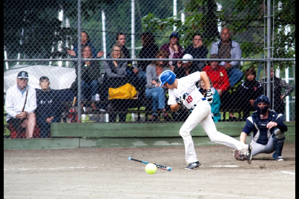 Number 19 of the Brewers in the first semi-final game of the weekend demonstrates his speed skating form as he sprints to first.