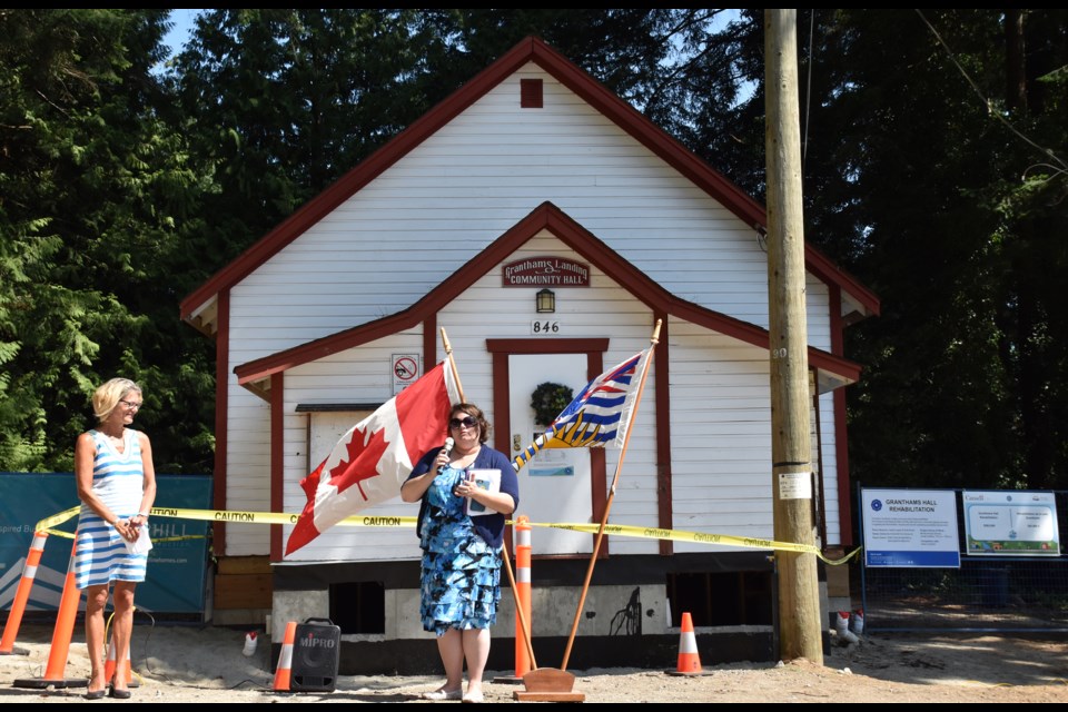 Lori Pratt, chair of the Sunshine Coast Regional District speaks at the Granthams Hall funding announcement, with MP Pamela Goldsmith-Jones (left).