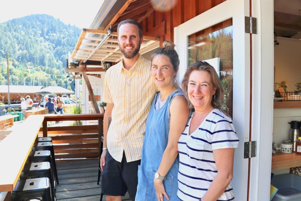 Zac Bligh, Renée Turner and Becky Paris Turner in front of the new Tell Your Friends Cafe.