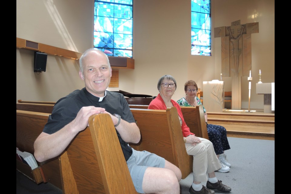 Our Saviour Lutheran pastor Christoph Reiners (left), with church musician Bev Krisch (centre) and church council member Ellen Toreson. Alan Campbell photo
