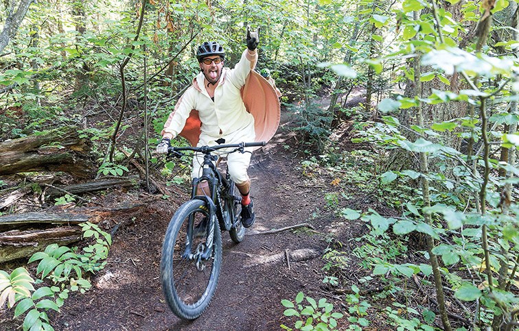 A costumed rider makes their way down the trails at Pidherny Recreation Site on Sunday morning on the way to the starting trail of the Redemption Funduro. Citizen Photo by James Doyle