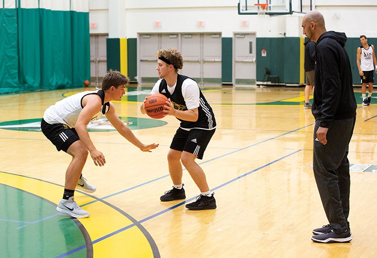 The UNBC Timberwolves men’s basketball team work on some drills at Northern Sport Centre on Sunday evening during a training session. Citizen Photo by James Doyle