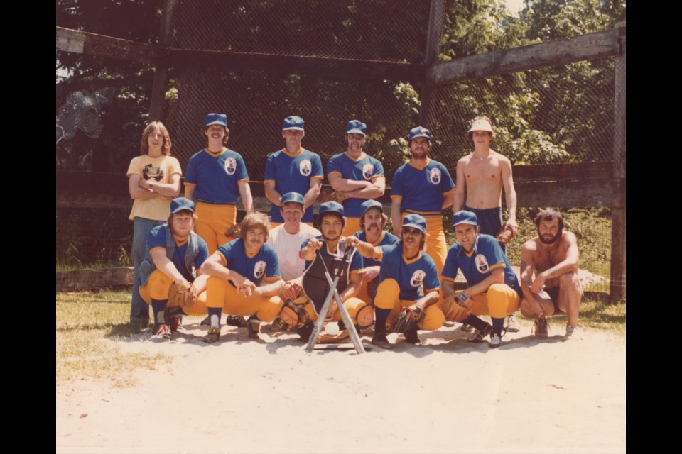 Bowen Island Men’s Baseball Team 1976. From left to right, front row: Chris McCulloch, Rick Morgan, ?, George Helenius, Kim Larsen, ?, John Sbragia, ?. From left to right, back row: ?, Don Toffaletto, ?, Nelson Riley, Eddie Weismiller, ? . (Please inform the Undercurrent if you know the missing names of any team members).