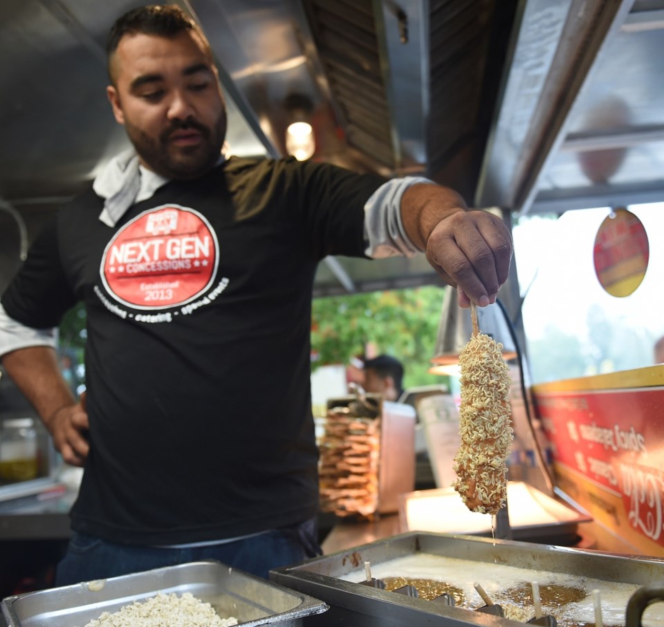 The PNE has no shortage of adventurous foods, such as the Cheesy Ramen Dog, which, as the name sugge