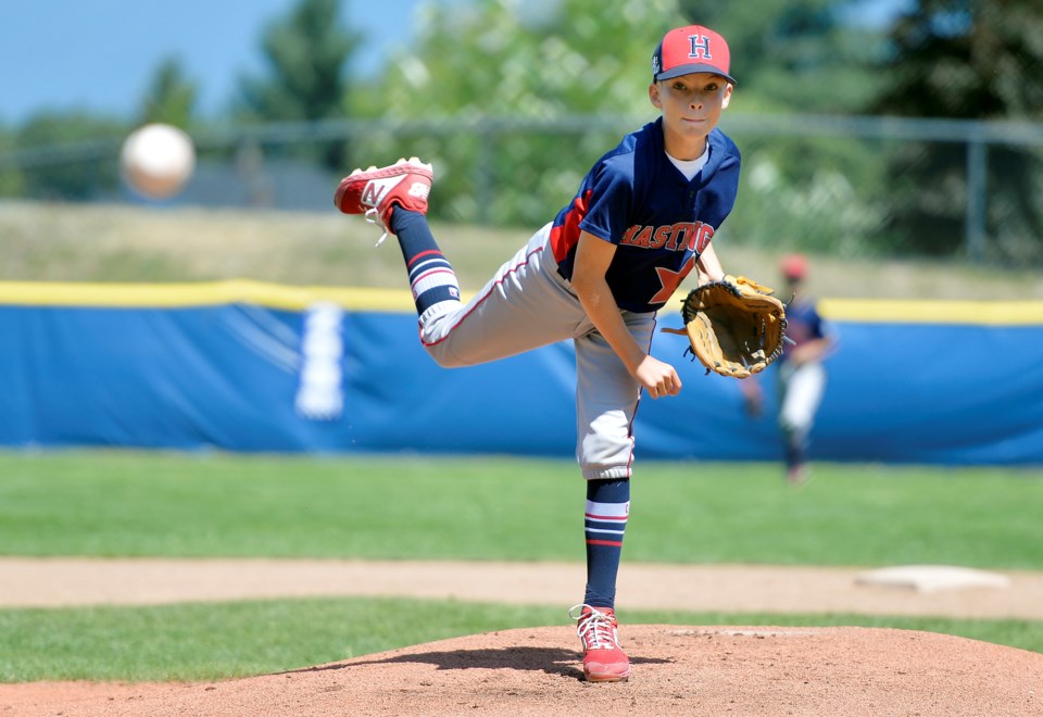 Hastings Little League pitcher Jack Ponton hurls a ball towards the plate at the Little League provi