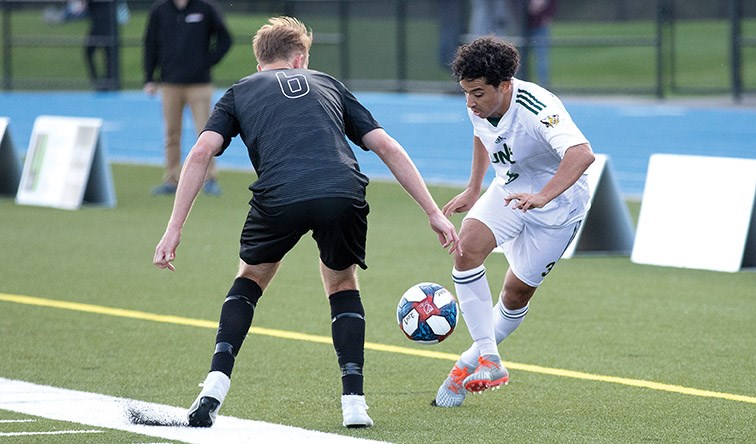UNBC Timberwolves forward Hussein Behery does a fancy little move to get the ball by UFV Cascades defender Trevor Zanatta on Friday evening at Masich Place Stadium during the men’s soccer team’s home opener. Citizen Photo by James Doyle