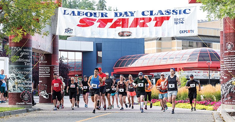 Runners participating in the 17 mile distance of the 46th annual Labour Day Classic running race take off from the start line at Canada Games Plaza on Sunday morning. Citizen Photo by James Doyle