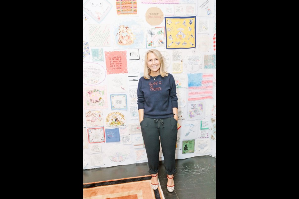 Diana Weymar at the opening of the Tiny Pricks exhibition at Lingua Franca in New York City. The Victoria artist curates a collection of textiles hand-stitched with the words of U.S. President Donald Trump.