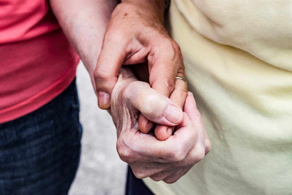 iStock, senior women's hands