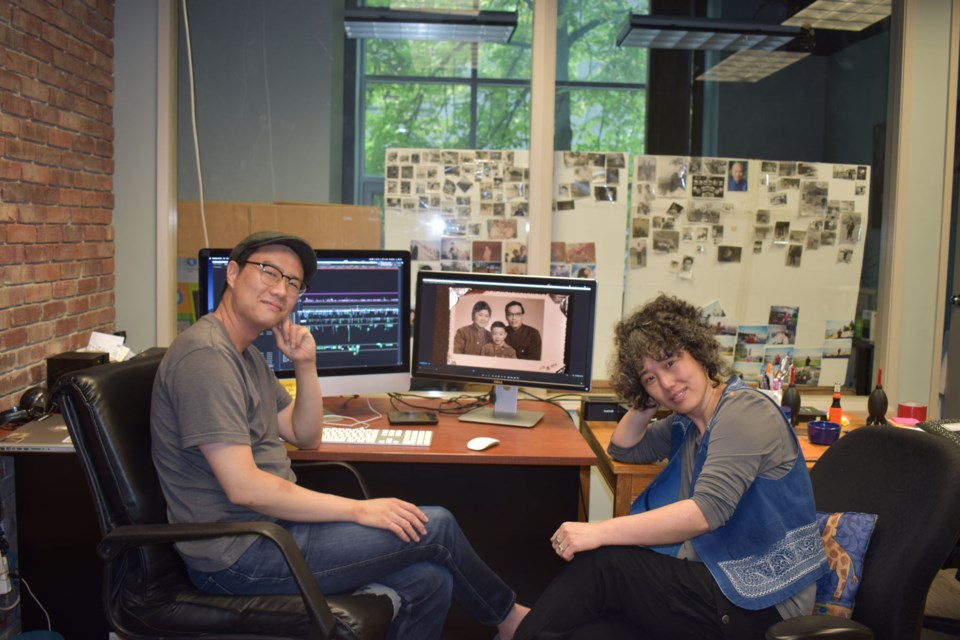 Ying Wang(right) and Lawrence Le Lam(left) were putting the finishing touches to their documentary in their studio before the film's world premiere.