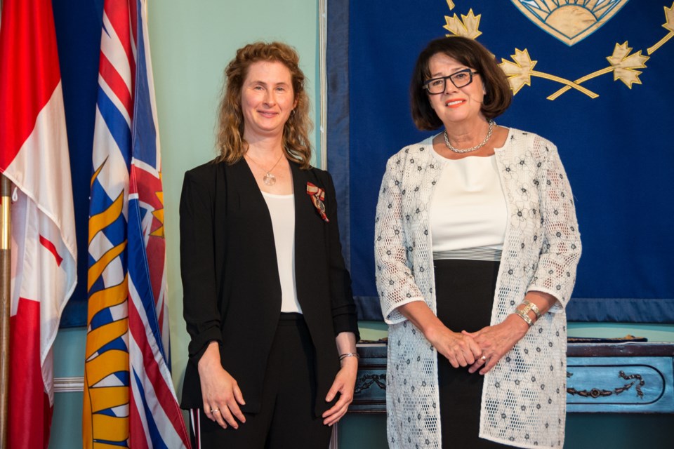 B.C. Lt.-Gov. Janet Austin, right, recently presented the Sovereign’s Medal for Volunteers to 44 B.C. recipients , including New Westminster teacher Christine McNulty.
