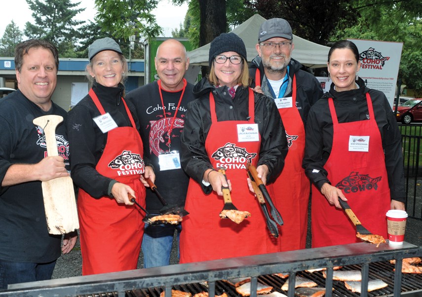 Salmon barbecue chef volunteers Gary Mussatto, British Pacific Properties’ Sue Rutledge, Park Royal’s Rick Amantea, North Vancouver City Mayor Linda Buchanan, Seaspan’s Peter Lister and Western Stevedoring’s Kim Steegman.