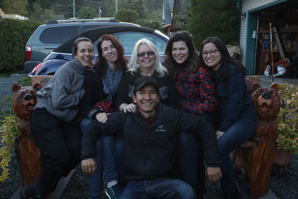 The film crew with Biker Bob's wife, Maudine Pervil. Photo Caleb Harding