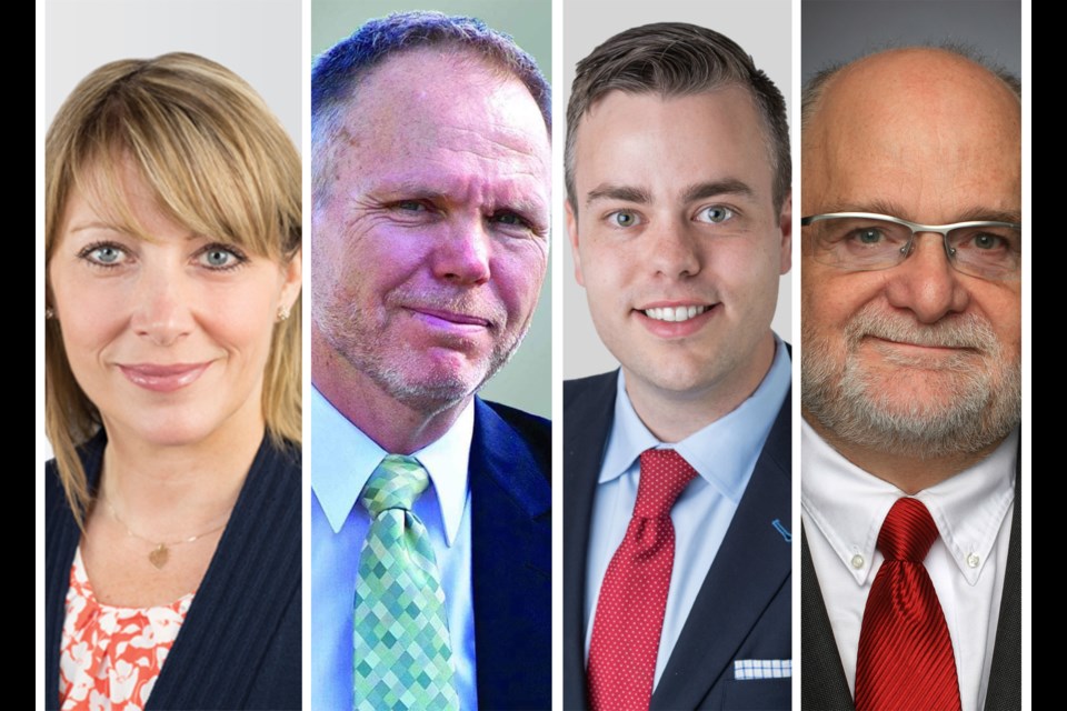 Candidates from the top four parties for Coquitlam-Port Coquitlam: from the left, challengers Christina Gower (NDP), Brad Nickason (Green), Nicholas Insley (Conservative), and incumbent Ron McKinnon (Liberal)
