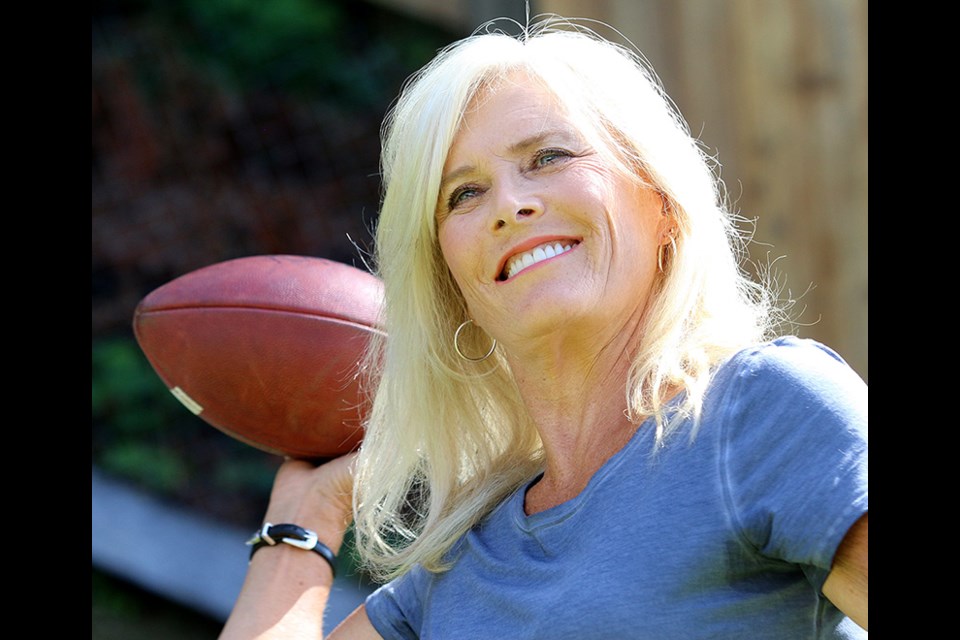 Port Moody's Deb Moore still loves tossing the football around more than 30 years after she quarterbacked her Century Plaza Mardi Gras touch football team to a women's national championship in 1986. That started a run of six consecutive Canadian titles and earned the team a place in the BC Football Hall of Fame as its first female inductees.