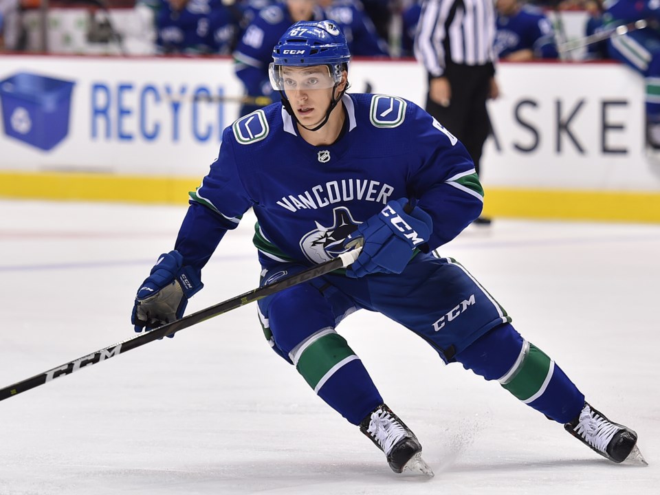 Lukas Jasek cuts across the ice for the Vancouver Canucks in the 2018 preseason.