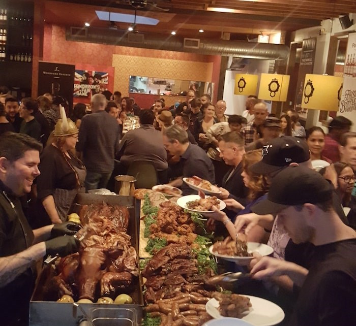 Loading plates at Barbarian’s Feast. Photo courtesy The Cascade Room