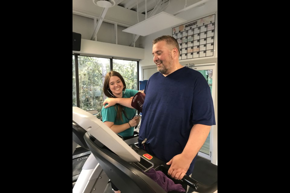 Tom Ellis - Tom pictured with Certified Clinical Exercise Physiologist, getting this blood pressure monitored during his supervised session.