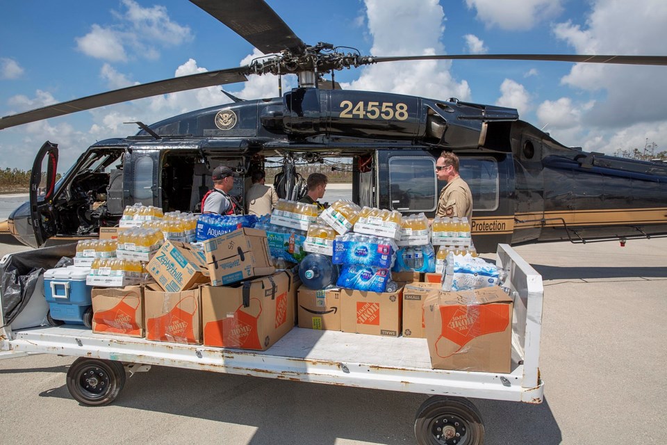 U.S. Customs and Border Protection agents deliver relief supplies to the Bahamas