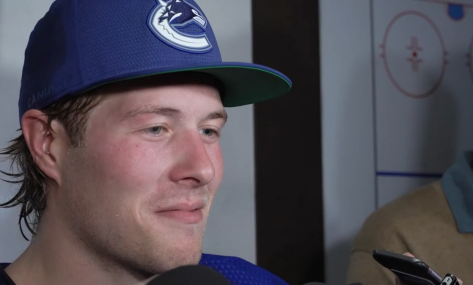 Brock Boeser speaks to the media after signing his three-year contract.