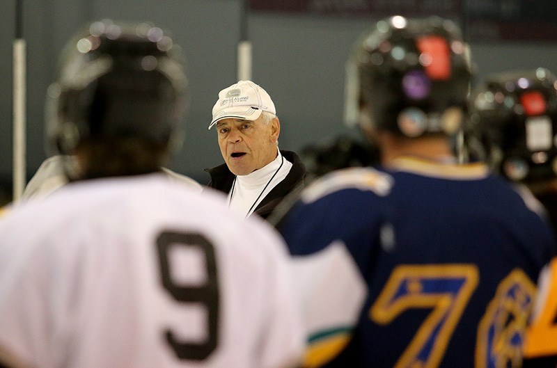 MARIO BARTEL/THE TRI-CITY NEWS
They may be old, but players attending the Tri-Cities Oldtimers Hockey League camp at Planet Ice still gather around one of the coaches to listen to his instruction attentively.