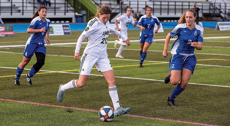 UNBC Timberwolves forward Sofia Jones looks to make a cross pass with the ball against the University of Lethbridge Pronghorns on Friday evening at Masich Place Stadium as the two teams met in Canada West women’s soccer action. Citizen Photo by James Doyle