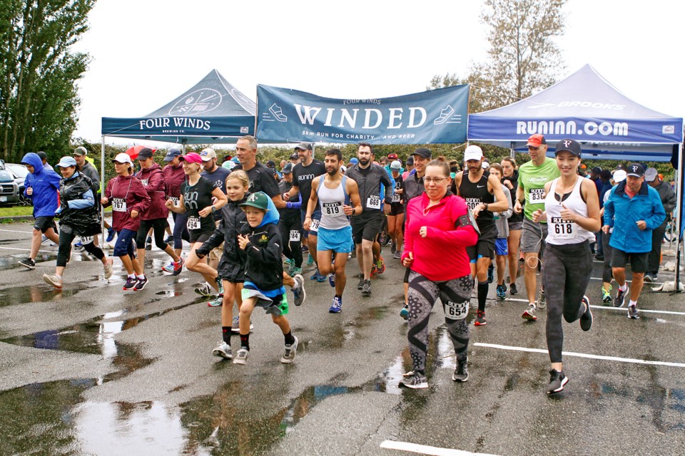 PHOTOS: Winded runners complete long and winding road_4
