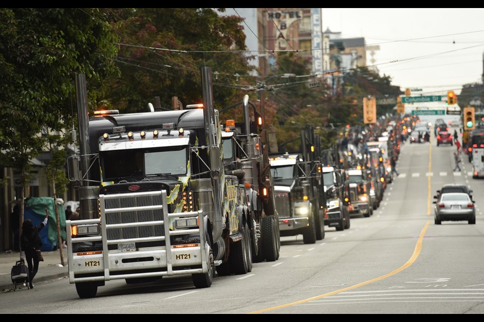 Hundreds of logging trucks lined up along Hastings Street as they made their way into Vancouver to protest the state of the B.C.’s forestry industry. Photo Dan Toulgoet