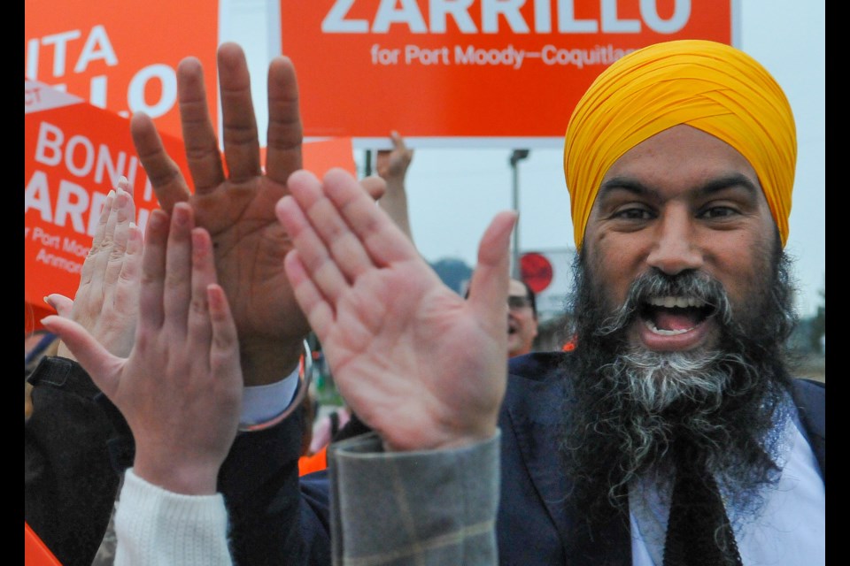 NDP leader Jagmeet Singh greets supports along St Johns Street in Port Moody Wednesday