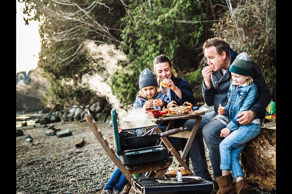 Chef David Robertson and his family picnicking on the beach in North Vancouver's Cates Park.