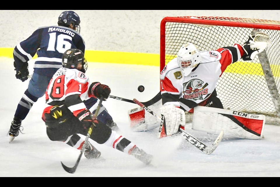 Mauricio Soriano makes a terrific cross-crease save early in third period on his way to recording a shutout in the Richmond Sockeyes' 5-0 win over North Vancouver on Thursday in a showdown of the last two undefeated teams in the Pacific Junior Hockey League.