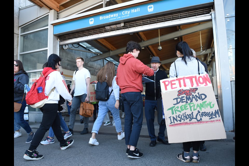 People from across Metro Vancouver have been making their way to Vancouver City Hall over the past few hours for the Global Climate Strike at city hall. Photo Dan Toulgoet